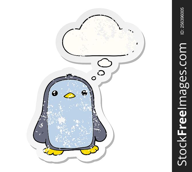 cute cartoon penguin with thought bubble as a distressed worn sticker