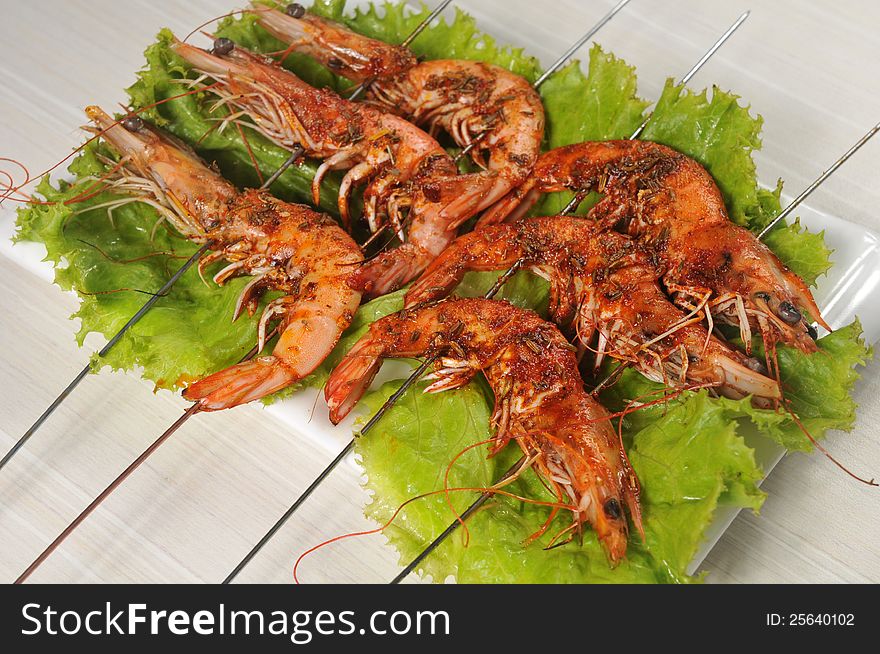 Barbecue; Grilled shrimp on a plate