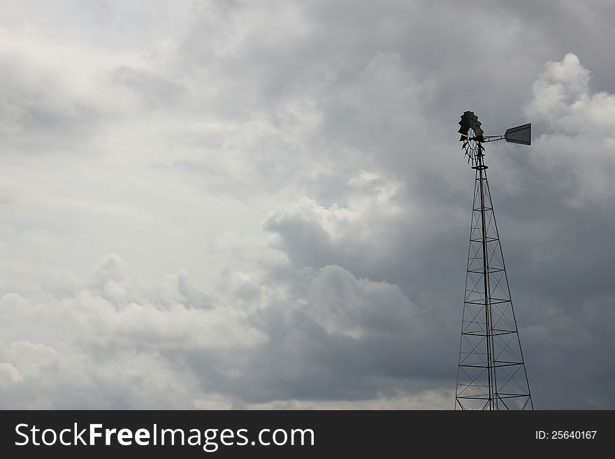 Stormy skies and windmill
