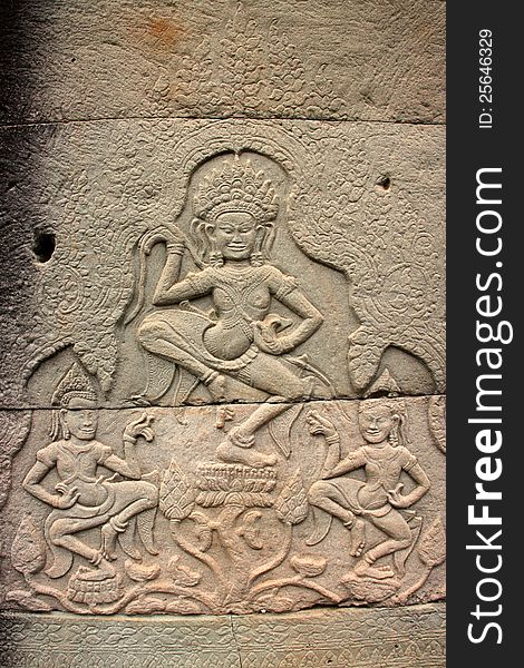 Sandstone carving on wall of Prasat Bayon, Angkor Thom, Siamreap, Khmer Republic. Sandstone carving on wall of Prasat Bayon, Angkor Thom, Siamreap, Khmer Republic
