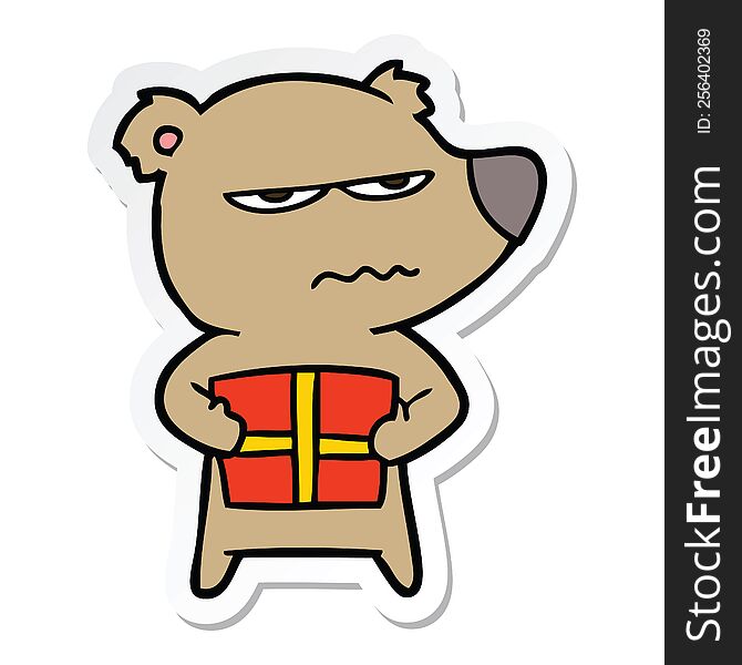 sticker of a angry bear cartoon holding present
