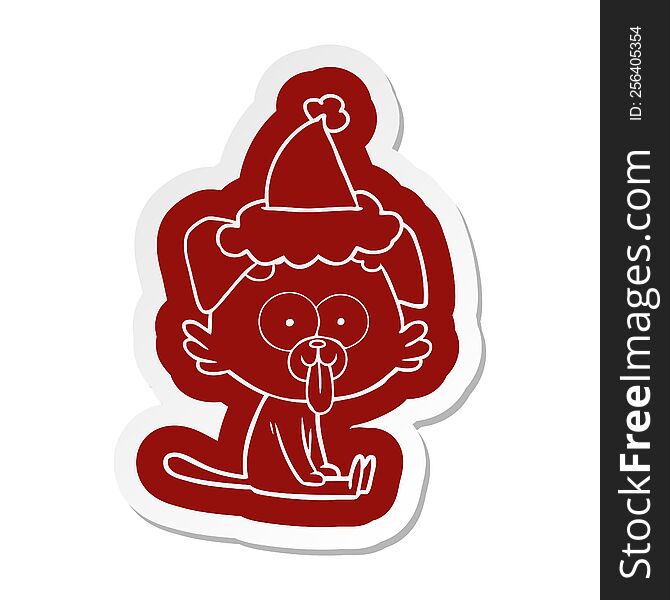 quirky cartoon  sticker of a sitting dog with tongue sticking out wearing santa hat