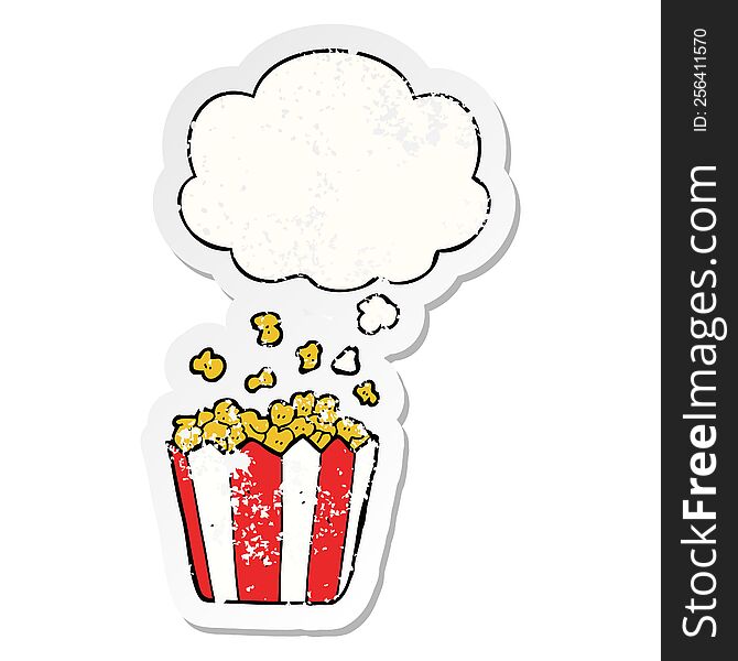 cartoon popcorn with thought bubble as a distressed worn sticker