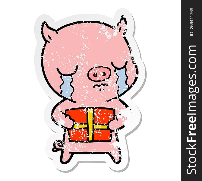 Distressed Sticker Of A Cartoon Pig Crying Over Christmas Present
