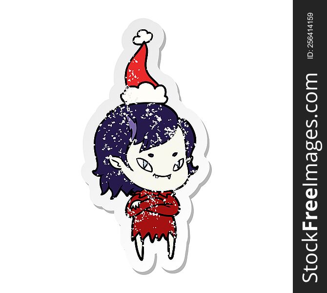 Distressed Sticker Cartoon Of A Friendly Vampire Girl Wearing Santa Hat