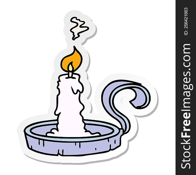 hand drawn sticker cartoon doodle of a candle holder and lit candle
