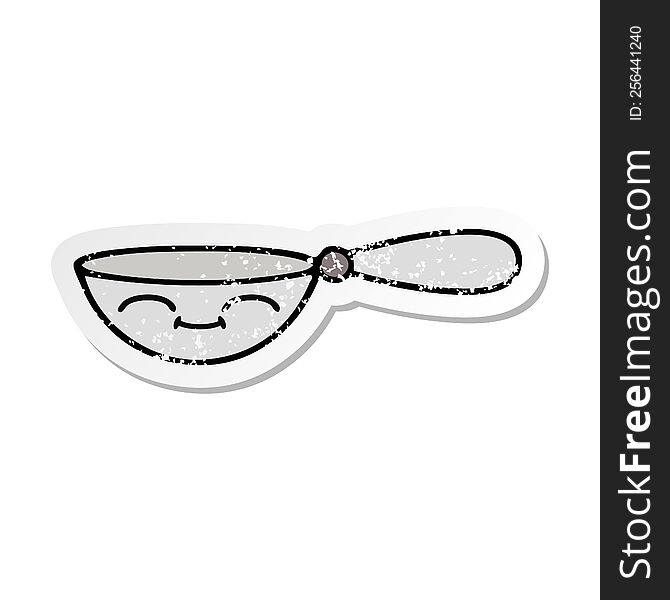 distressed sticker of a cute cartoon measuring spoon