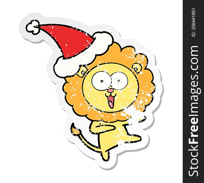 happy hand drawn distressed sticker cartoon of a lion wearing santa hat. happy hand drawn distressed sticker cartoon of a lion wearing santa hat