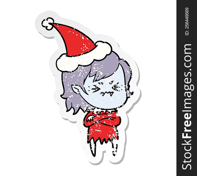 Annoyed Distressed Sticker Cartoon Of A Vampire Girl Wearing Santa Hat