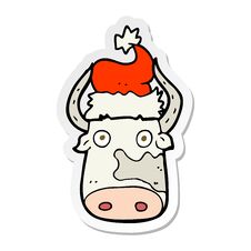 Sticker Of A Cartoon Cow Wearing Christmas Hat Stock Photo