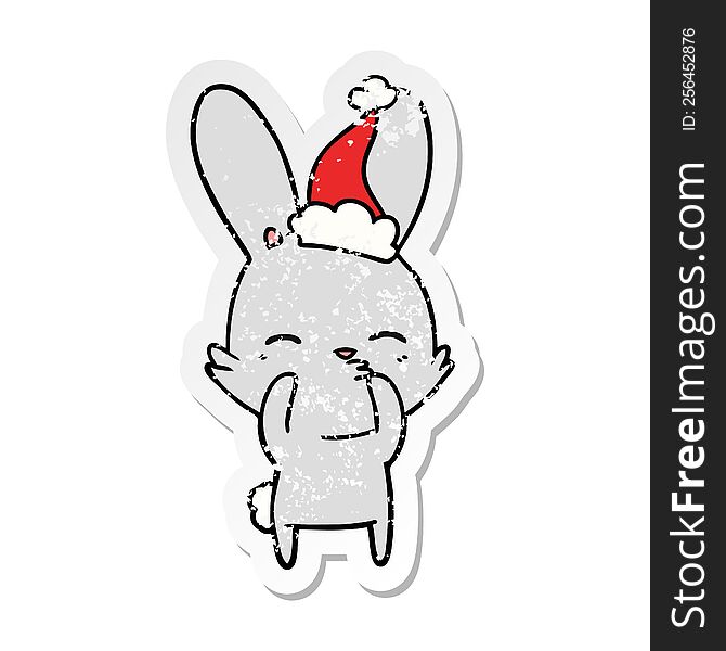 Curious Bunny Distressed Sticker Cartoon Of A Wearing Santa Hat