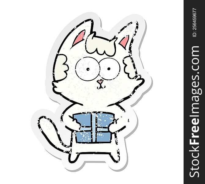 Distressed Sticker Of A Happy Cartoon Cat With Present