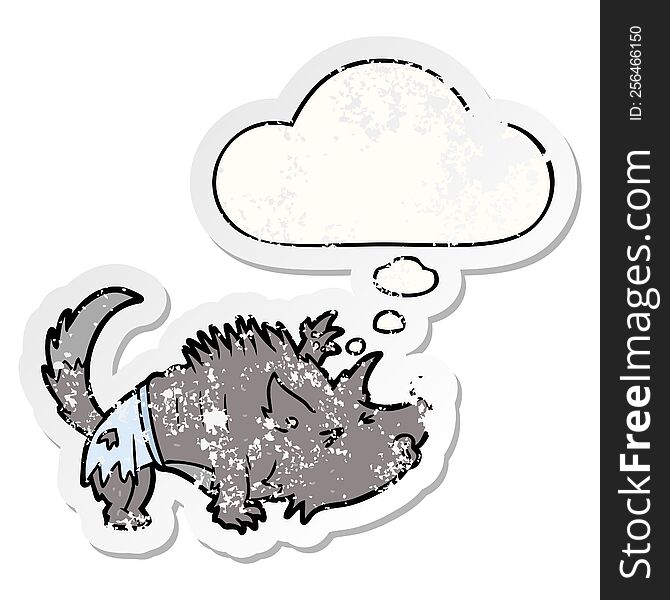 cartoon werewolf with thought bubble as a distressed worn sticker