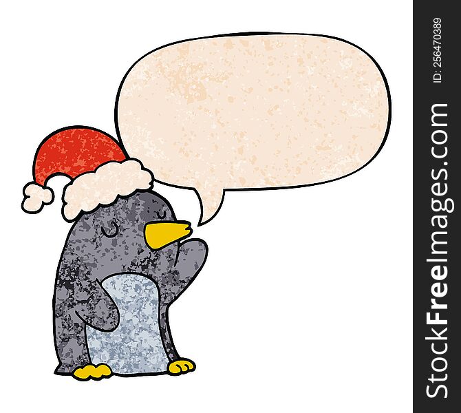 cute cartoon christmas penguin with speech bubble in retro texture style