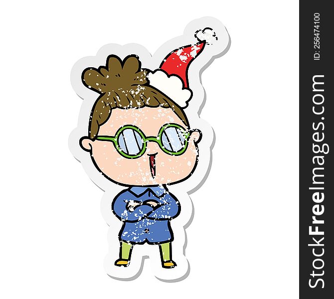 distressed sticker cartoon of a woman wearing spectacles wearing santa hat