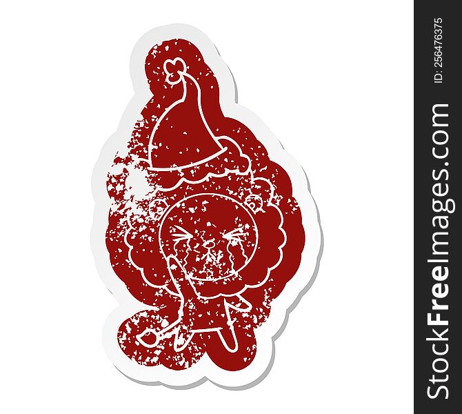 Cartoon Distressed Sticker Of A Crying Lion Wearing Santa Hat