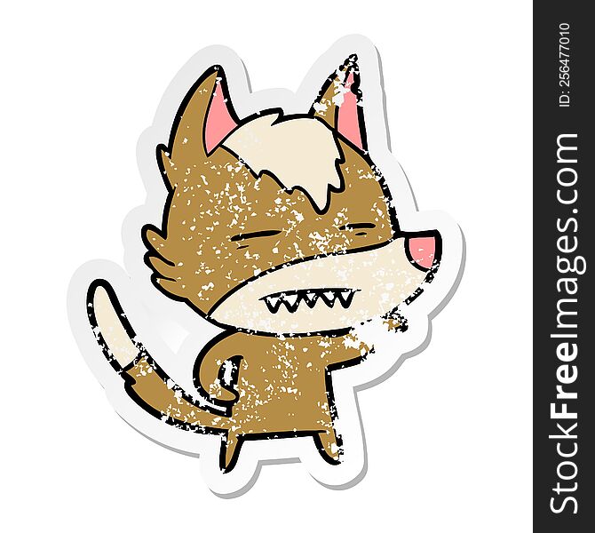 distressed sticker of a cartoon wolf showing teeth