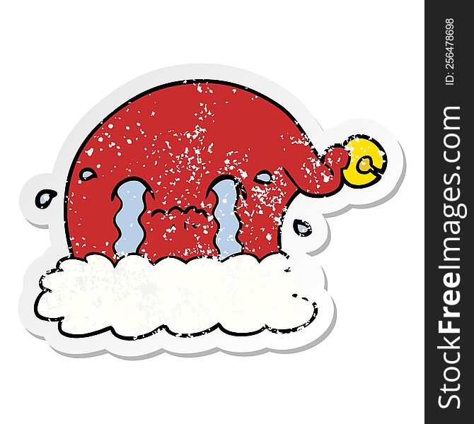 Distressed Sticker Of A Cartoon Christmas Santa Hat Crying