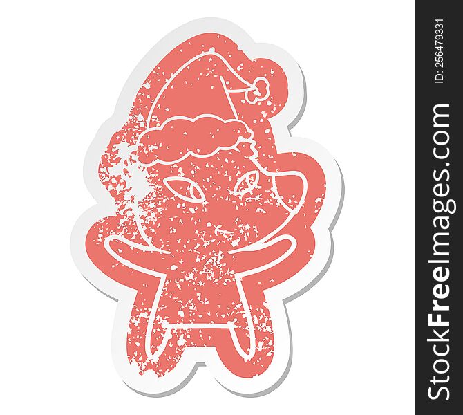 cute quirky cartoon distressed sticker of a bear wearing santa hat