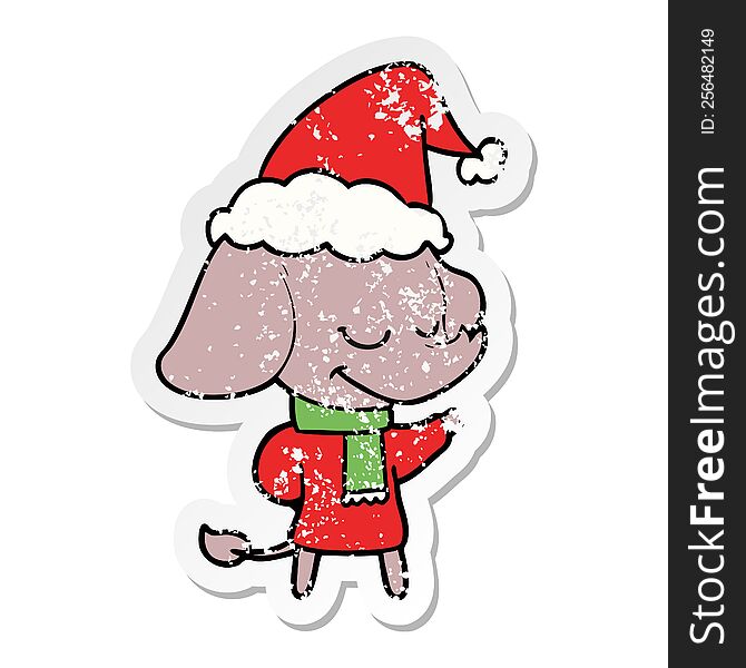 Distressed Sticker Cartoon Of A Smiling Elephant Wearing Scarf Wearing Santa Hat