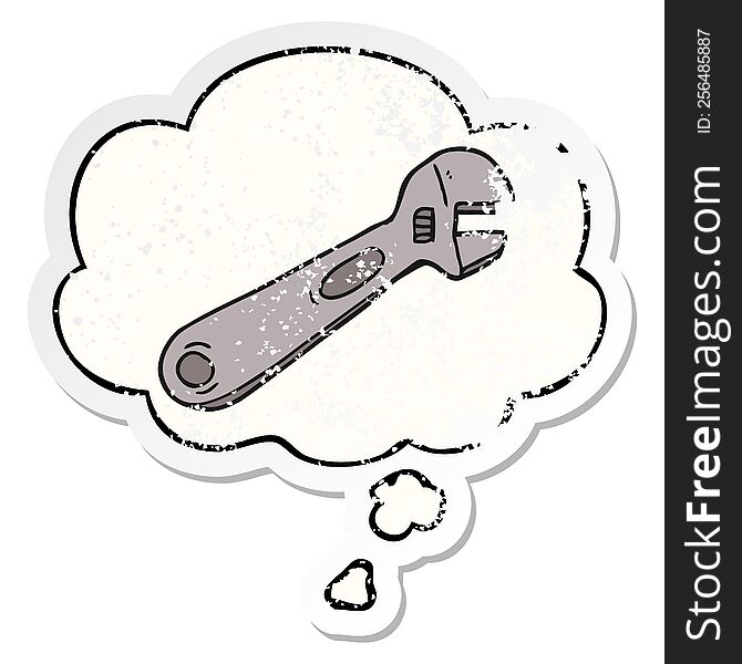 cartoon spanner with thought bubble as a distressed worn sticker