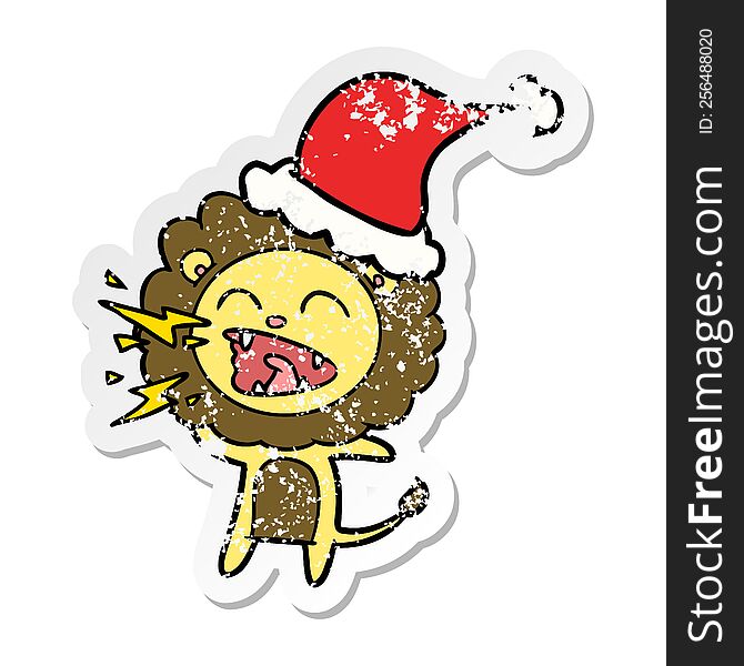 hand drawn distressed sticker cartoon of a roaring lion wearing santa hat