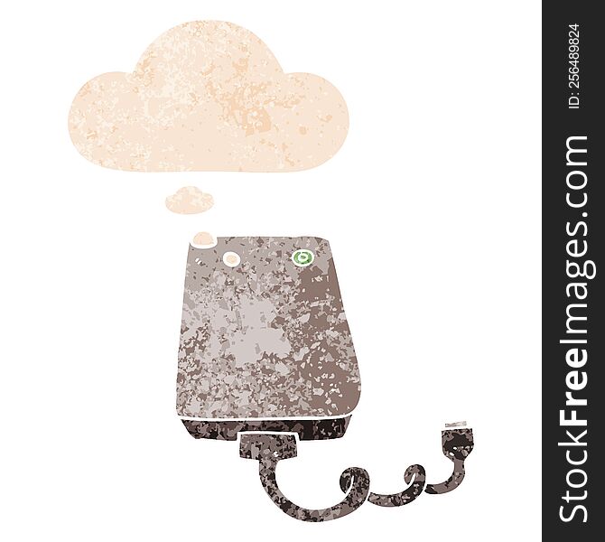 cartoon hard drive with thought bubble in grunge distressed retro textured style. cartoon hard drive with thought bubble in grunge distressed retro textured style