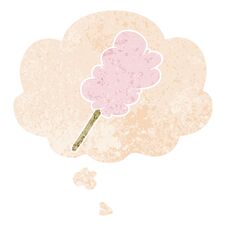 Cartoon Candy Floss And Thought Bubble In Retro Textured Style Royalty Free Stock Photo