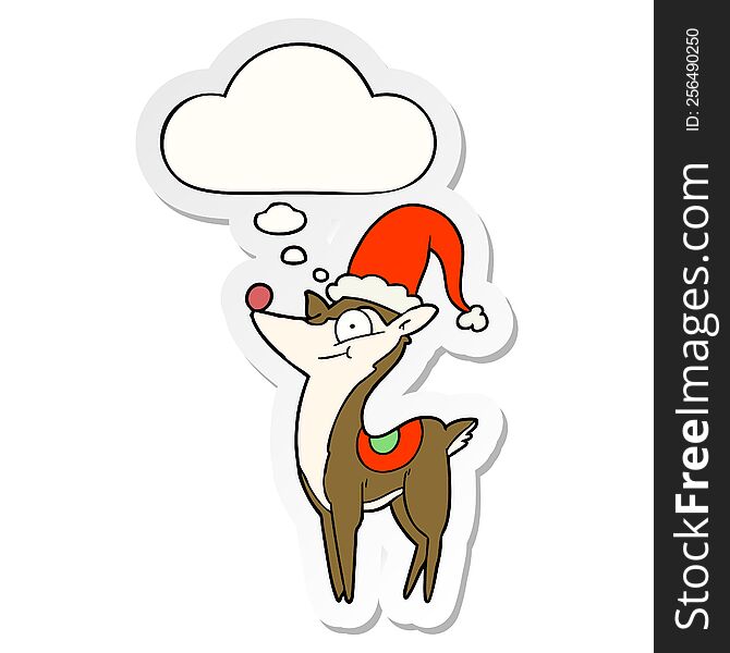 cartoon christmas reindeer and thought bubble as a printed sticker