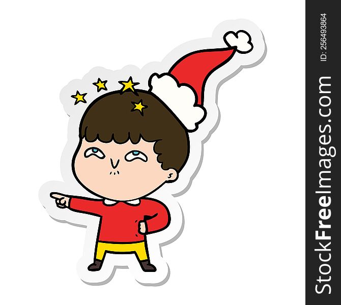 sticker cartoon of a amazed boy wearing santa hat