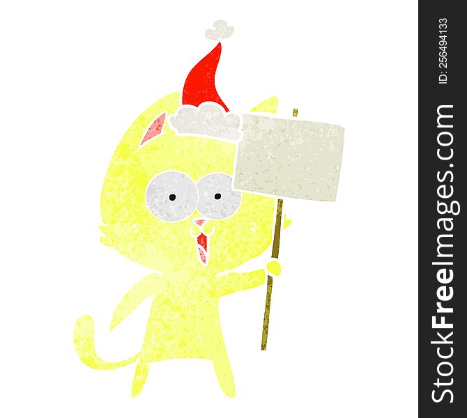 funny hand drawn retro cartoon of a cat with sign wearing santa hat. funny hand drawn retro cartoon of a cat with sign wearing santa hat