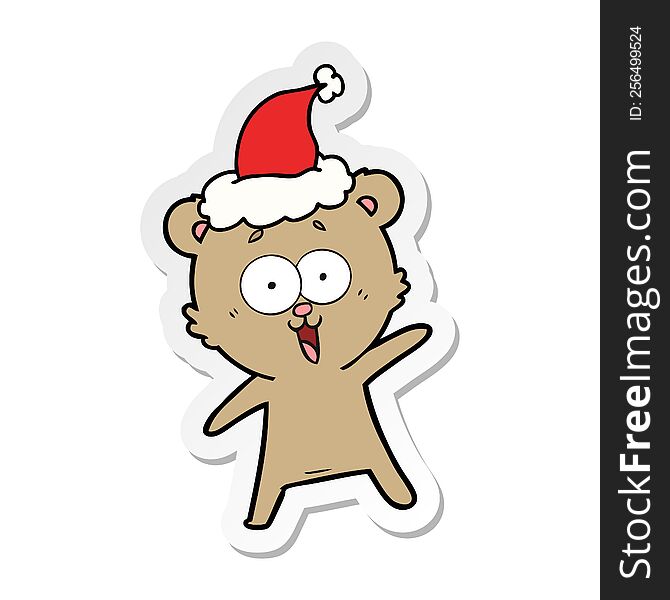 laughing teddy  bear sticker cartoon of a wearing santa hat