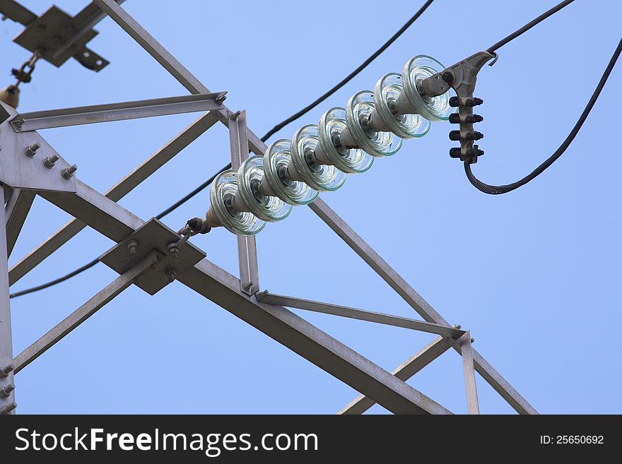 Insulators power lines close in the sky