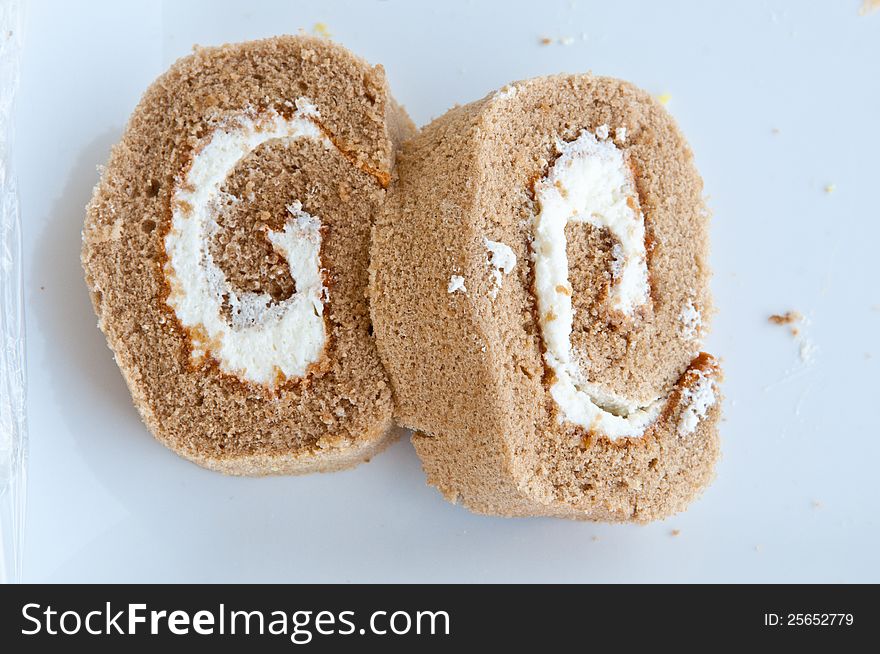 Two chocolate Swiss roll closeup.