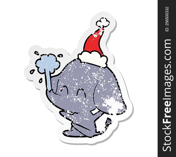 cute hand drawn distressed sticker cartoon of a elephant spouting water wearing santa hat