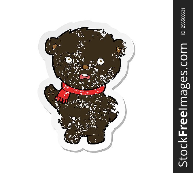 retro distressed sticker of a cartoon black bear wearing scarf