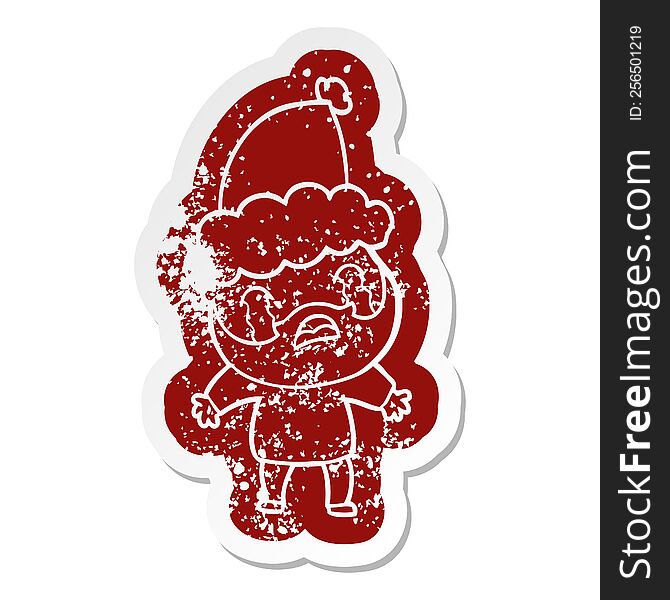 Cartoon Distressed Sticker Of A Bearded Man Crying Wearing Santa Hat