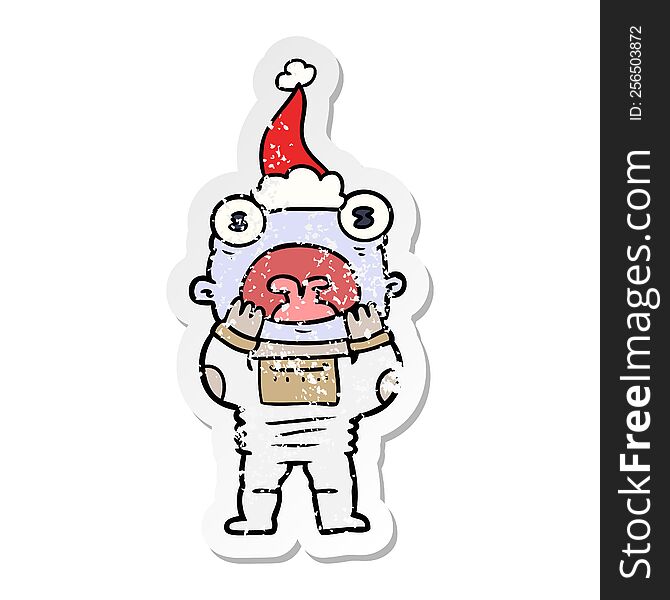 Distressed Sticker Cartoon Of A Alien Gasping In Surprise Wearing Santa Hat