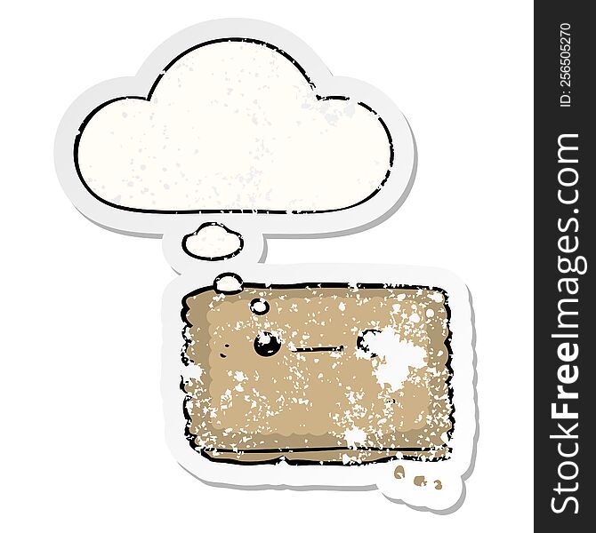 Cartoon Biscuit And Thought Bubble As A Distressed Worn Sticker