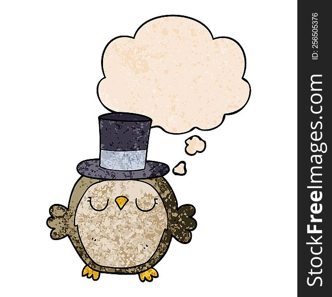 cartoon owl wearing top hat with thought bubble in grunge texture style. cartoon owl wearing top hat with thought bubble in grunge texture style