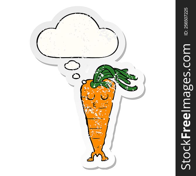cartoon carrot with thought bubble as a distressed worn sticker