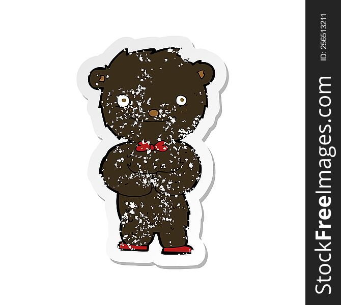 retro distressed sticker of a cartoon little black bear