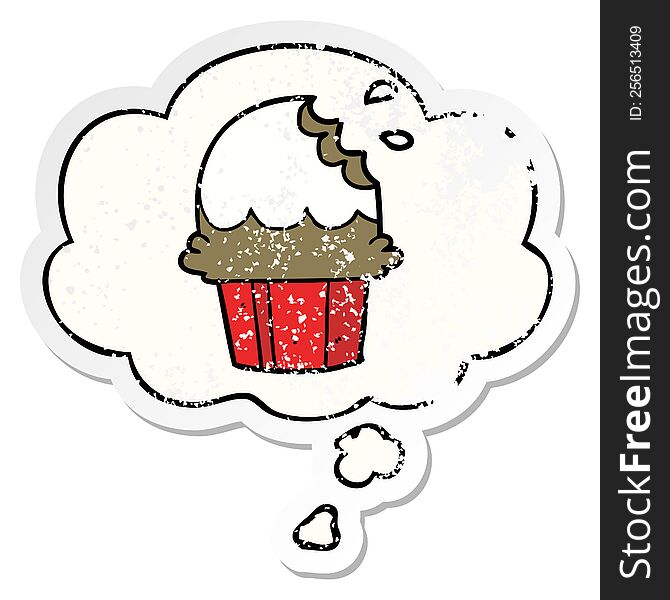 Cartoon Cupcake And Thought Bubble As A Distressed Worn Sticker