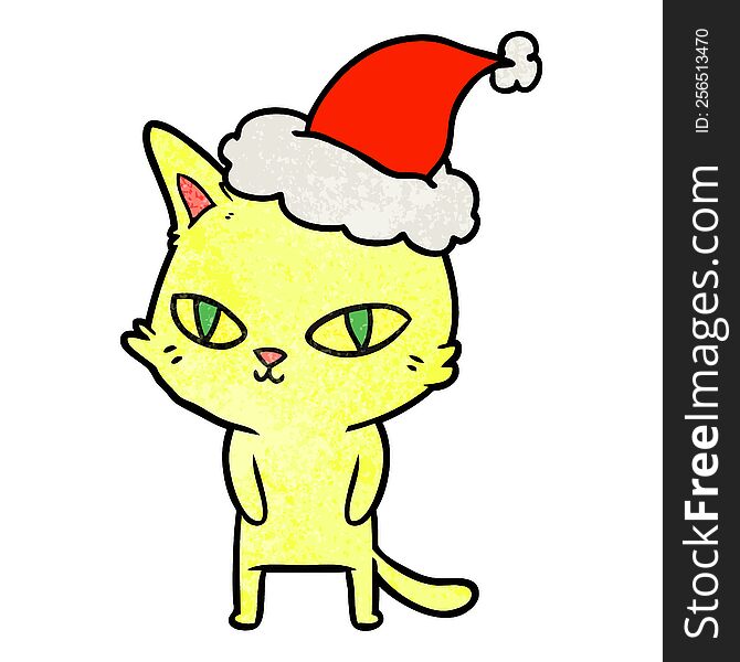 hand drawn textured cartoon of a cat with bright eyes wearing santa hat