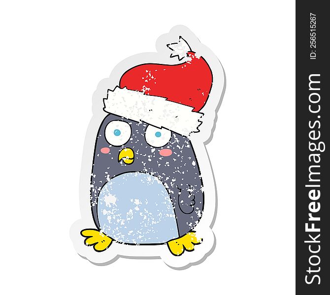 Retro Distressed Sticker Of A Cartoon Penguin In Christmas Hat