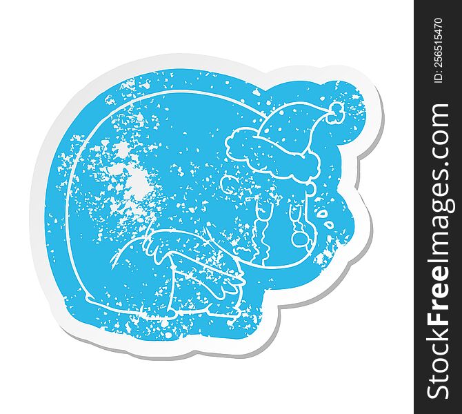 Crying Cartoon Distressed Sticker Of A Polar Bear Wearing Santa Hat