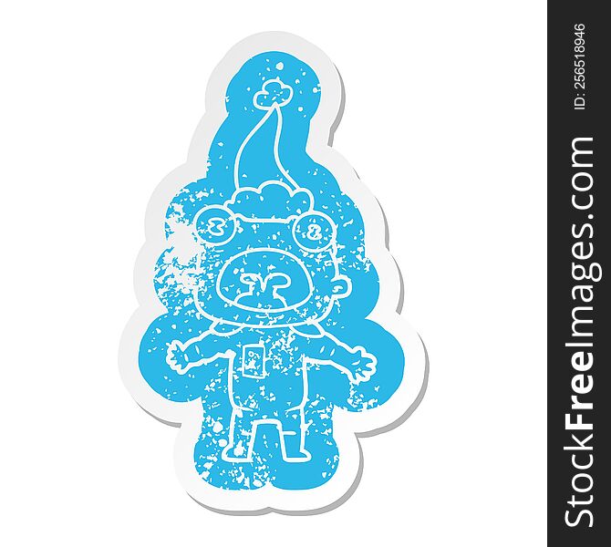 quirky cartoon distressed sticker of a weird alien communicating wearing santa hat