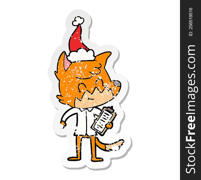 hand drawn distressed sticker cartoon of a friendly fox manager wearing santa hat