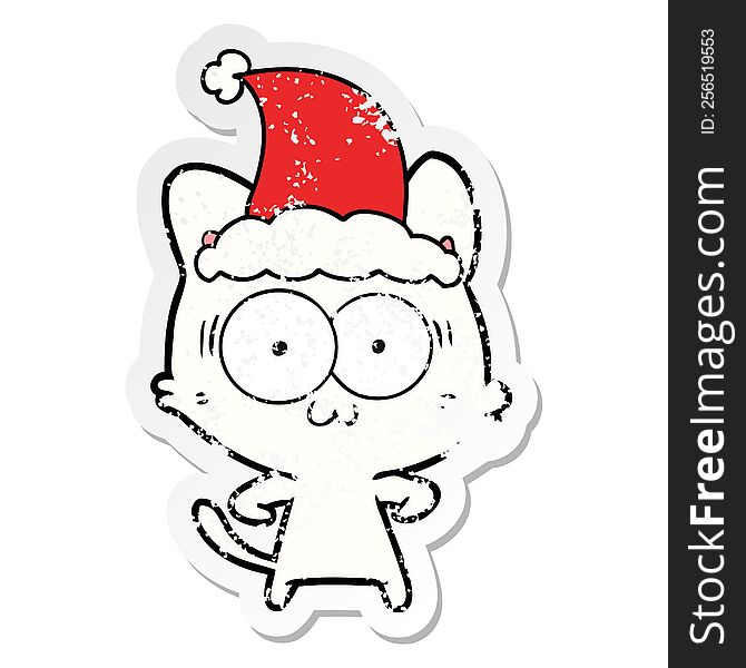 Distressed Sticker Cartoon Of A Surprised Cat Wearing Santa Hat
