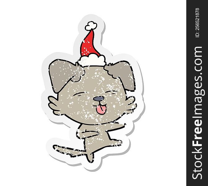 Distressed Sticker Cartoon Of A Dog Dancing Wearing Santa Hat